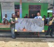 Penyerahan Bantuan oleh Pemda Puncak Jaya (Kabag Umum Setda) kepada Mahasiswa Puncak Jaya